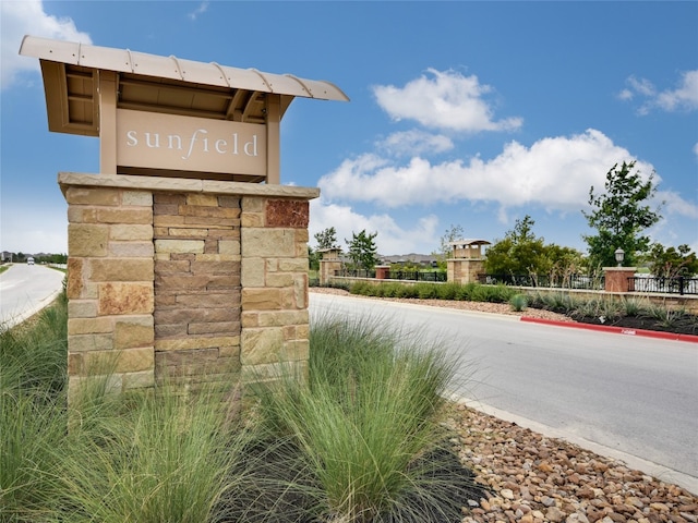 view of community sign