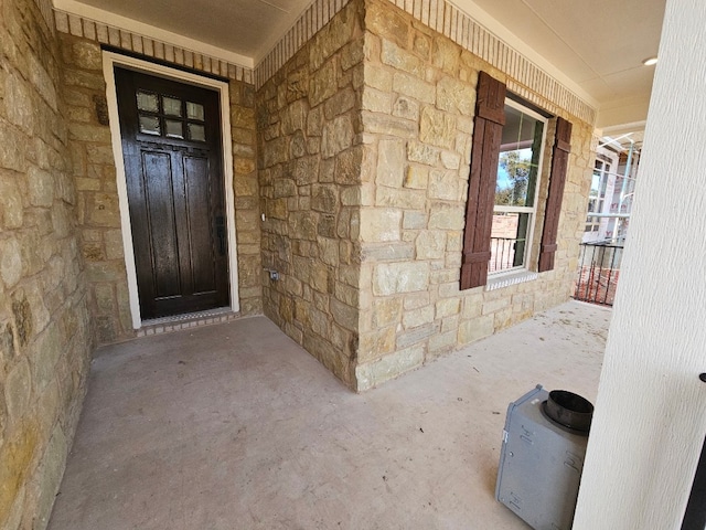 property entrance with a porch