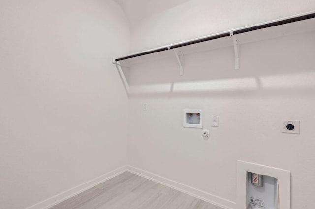 laundry room featuring baseboards, washer hookup, laundry area, hookup for a gas dryer, and electric dryer hookup