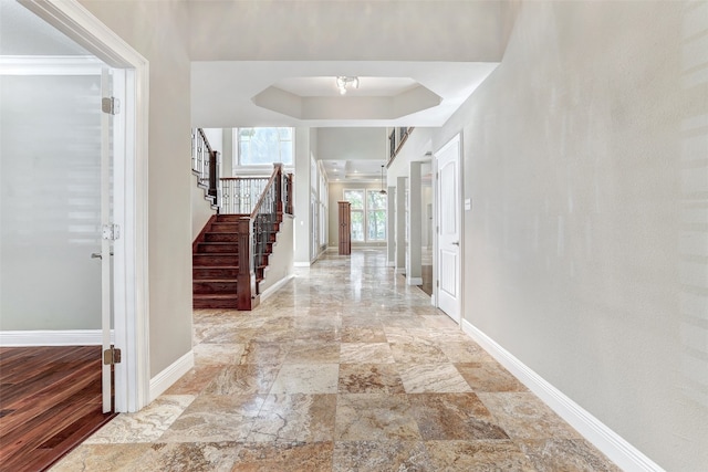 hall with wood-type flooring