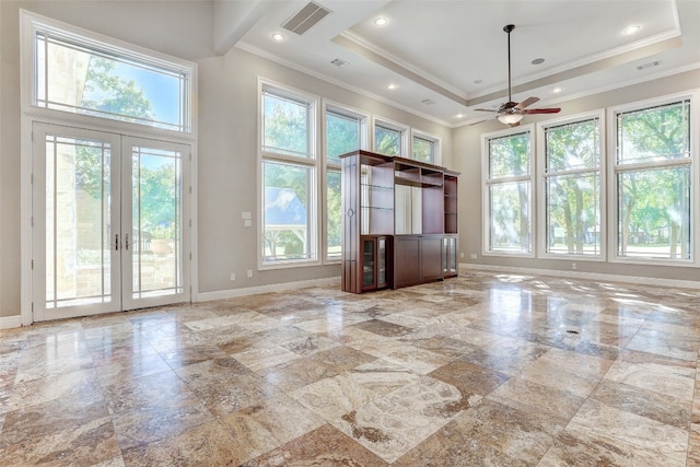 unfurnished living room featuring light tile patterned floors, french doors, and ceiling fan