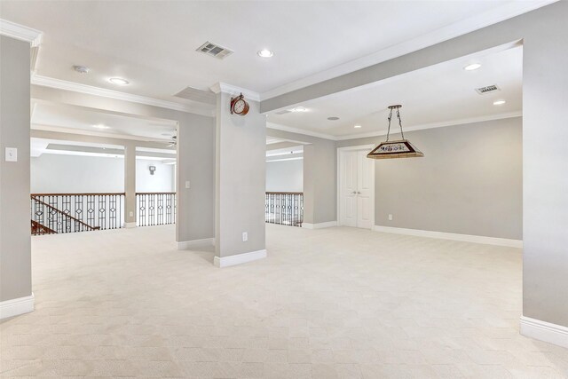 unfurnished living room with ceiling fan, ornamental molding, and light colored carpet