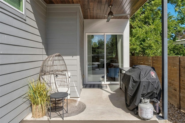 view of patio / terrace featuring ceiling fan and a grill