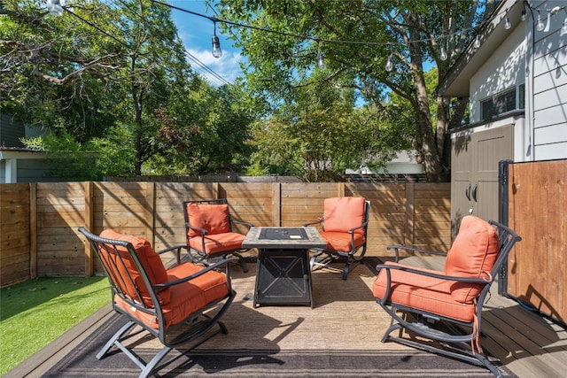 view of patio featuring an outdoor fire pit