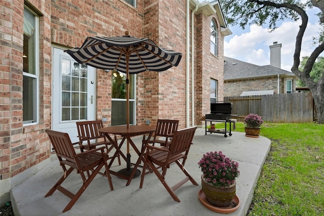 view of patio / terrace with fence