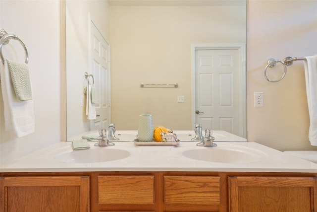 bathroom with double sink vanity