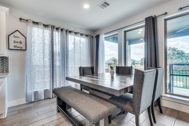 dining space featuring light hardwood / wood-style floors