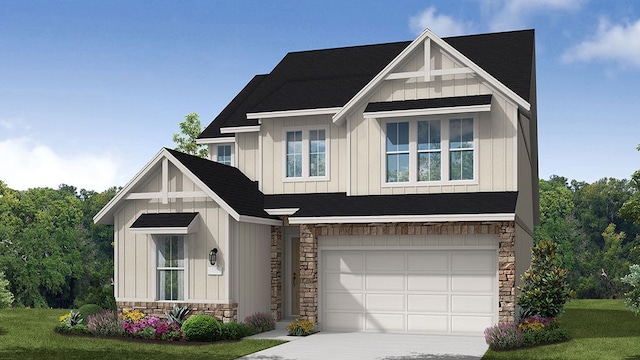 view of front of home featuring a garage and a front lawn