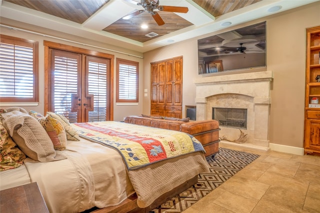 tiled bedroom with wood ceiling, ceiling fan, a high end fireplace, and french doors