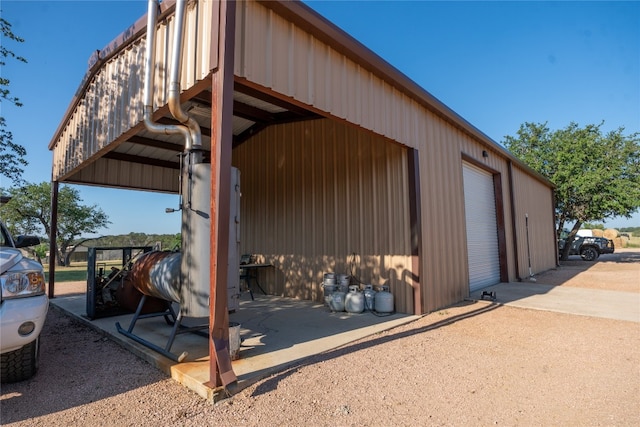 view of outbuilding with a garage