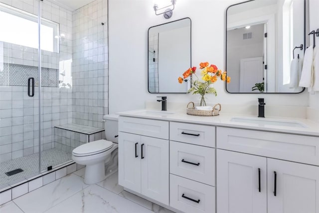 full bath featuring marble finish floor, visible vents, a sink, and a stall shower