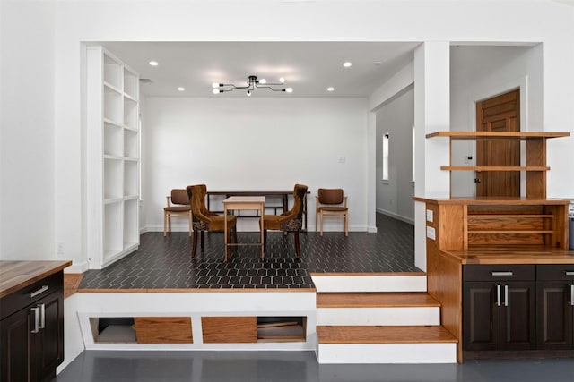 dining room featuring recessed lighting and baseboards