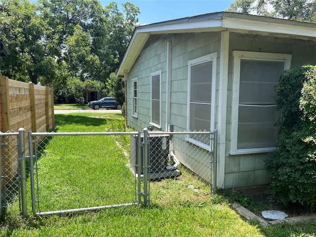 view of outbuilding featuring a yard