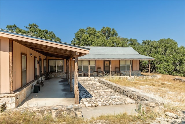 back of house featuring a patio area