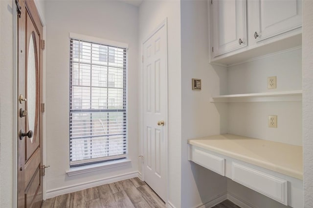 3001 Cedar St Unit A-116, Austin, TX 78705 - mudroom with light wood-style floors and baseboards