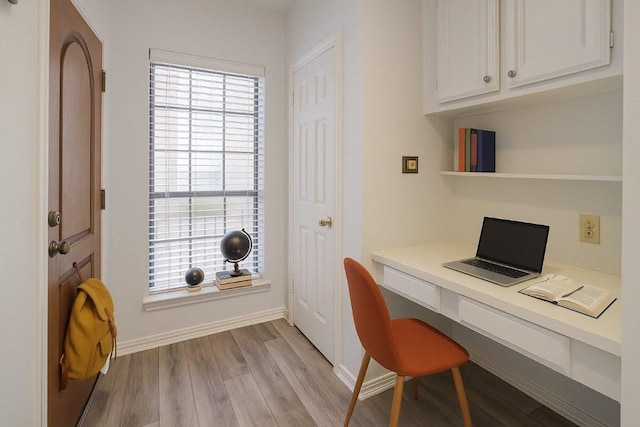 3001 Cedar St Unit A-116, Austin, TX 78705 - home office featuring light wood finished floors and built in study area