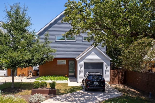 view of front of property with a garage