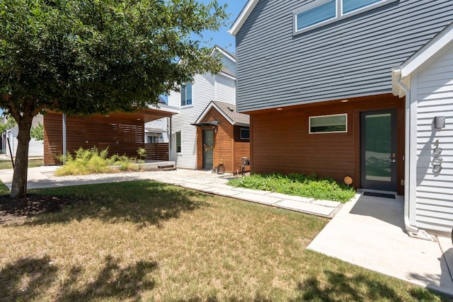 exterior space featuring a front yard