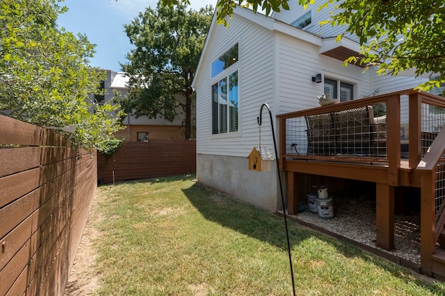 view of yard featuring a wooden deck