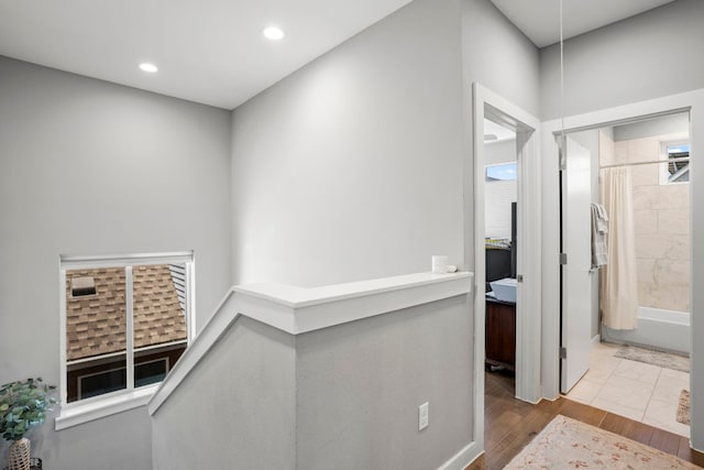 hallway featuring hardwood / wood-style floors