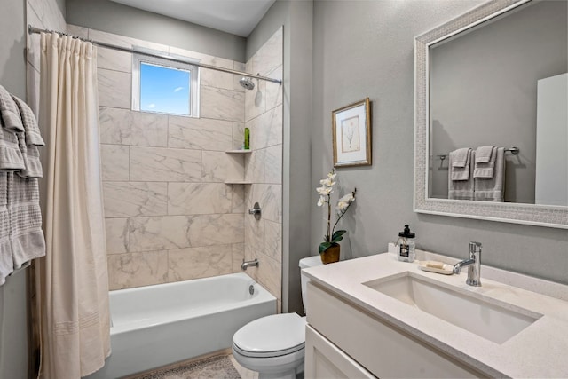 full bathroom featuring shower / bath combo with shower curtain, vanity, and toilet