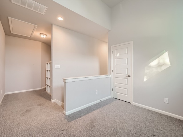 spare room with carpet floors