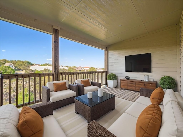 wooden deck featuring an outdoor hangout area