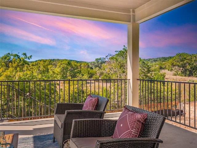 patio terrace at dusk with a balcony