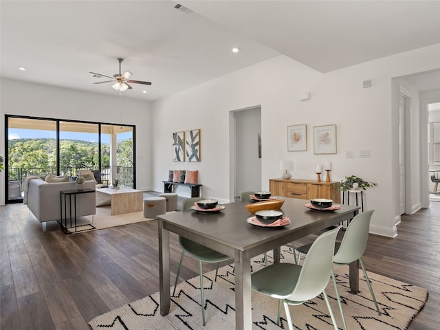 dining room featuring ceiling fan and dark hardwood / wood-style floors