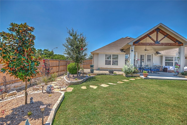 view of yard featuring ceiling fan