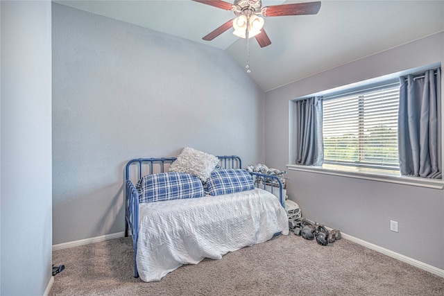 bedroom featuring ceiling fan, carpet, and vaulted ceiling