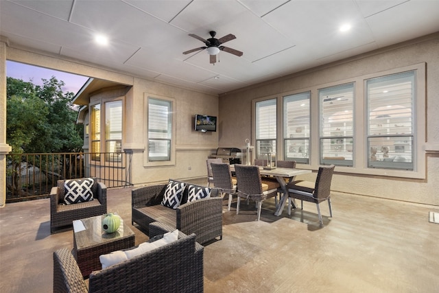 view of patio with ceiling fan and an outdoor hangout area