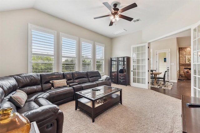 1104 Lions Lair, Leander, TX 78641 - living area featuring french doors, vaulted ceiling, ceiling fan, and carpet flooring