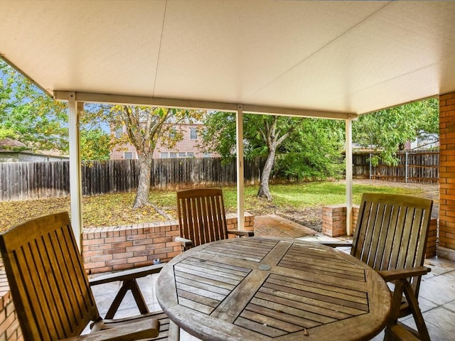 905 E Olympic Dr, Pflugerville, TX 78660 - fenced backyard featuring a patio and outdoor dining space
