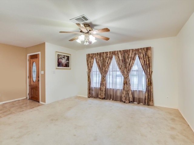 905 E Olympic Dr, Pflugerville, TX 78660 - unfurnished room featuring light carpet and a ceiling fan