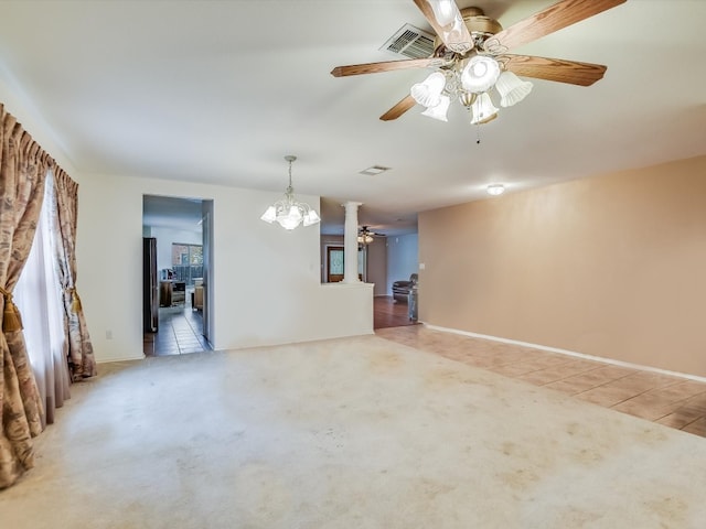 905 E Olympic Dr, Pflugerville, TX 78660 - unfurnished living room with a ceiling fan, a chandelier, light colored carpet, and light tile patterned floors