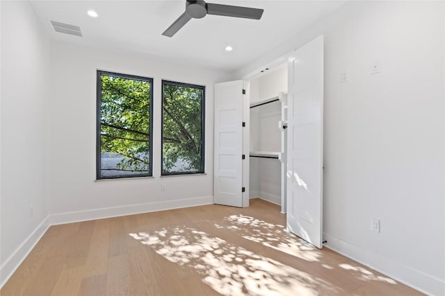 2109 Wordsworth Dr Unit 1, Austin, TX 78704 - unfurnished bedroom with light wood finished floors, baseboards, recessed lighting, and a ceiling fan