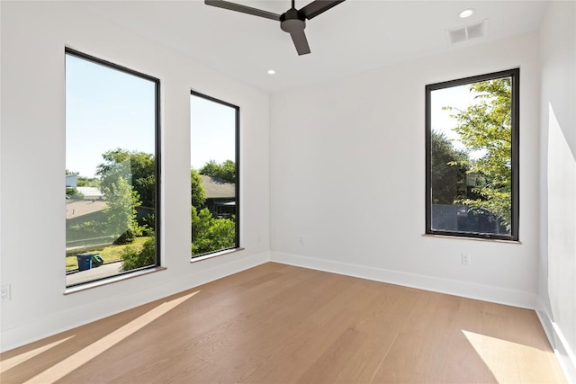 2109 Wordsworth Dr Unit 1, Austin, TX 78704 - spare room with ceiling fan, light wood-style floors, and recessed lighting