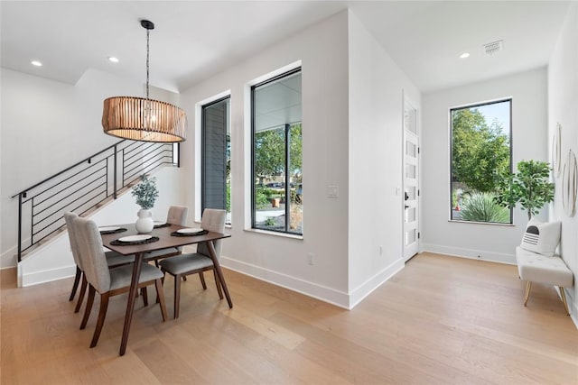 2109 Wordsworth Dr Unit 1, Austin, TX 78704 - dining space with light wood-type flooring, recessed lighting, and stairs