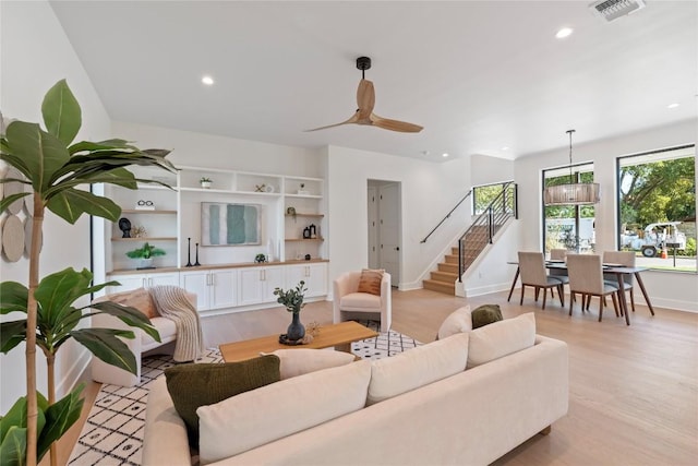 2109 Wordsworth Dr Unit 1, Austin, TX 78704 - living room with stairway, light wood-style flooring, recessed lighting, and ceiling fan