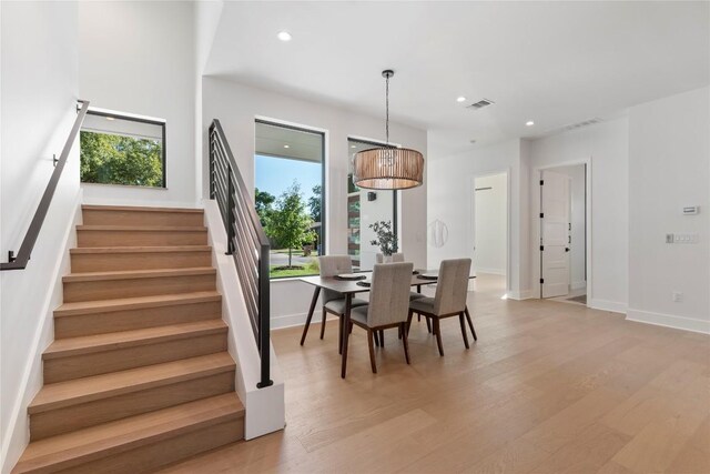 2109 Wordsworth Dr Unit 1, Austin, TX 78704 - dining room with stairs, light wood-type flooring, and recessed lighting
