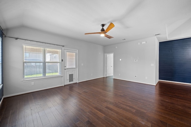 unfurnished living room with ceiling fan, vaulted ceiling, and hardwood / wood-style flooring