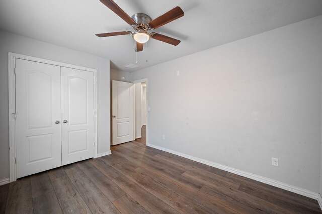 unfurnished bedroom featuring a closet, ceiling fan, and wood-type flooring