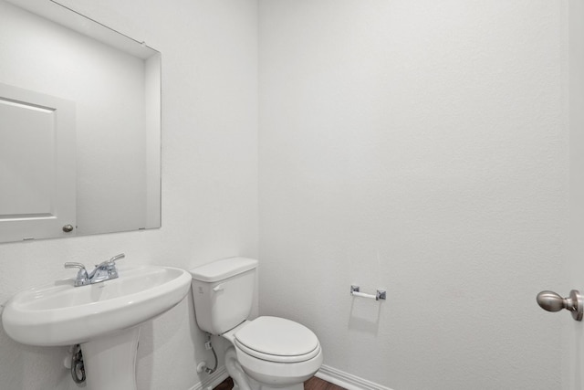 bathroom featuring toilet