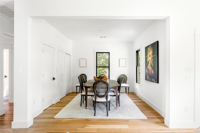 dining room featuring light hardwood / wood-style floors