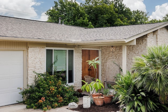 entrance to property featuring a garage