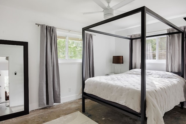 bedroom featuring concrete floors and ceiling fan