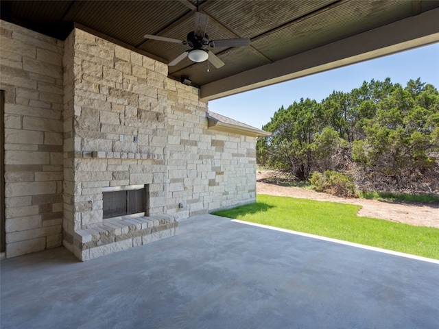 view of patio featuring ceiling fan