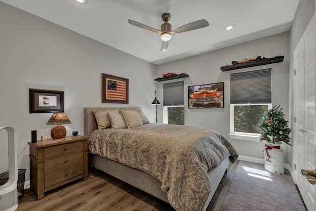 bedroom featuring recessed lighting, light wood-type flooring, baseboards, and a ceiling fan