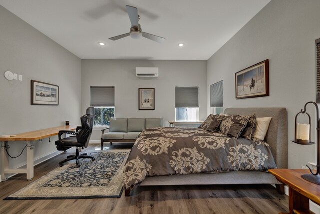 bedroom featuring a wall mounted AC, ceiling fan, and dark hardwood / wood-style flooring